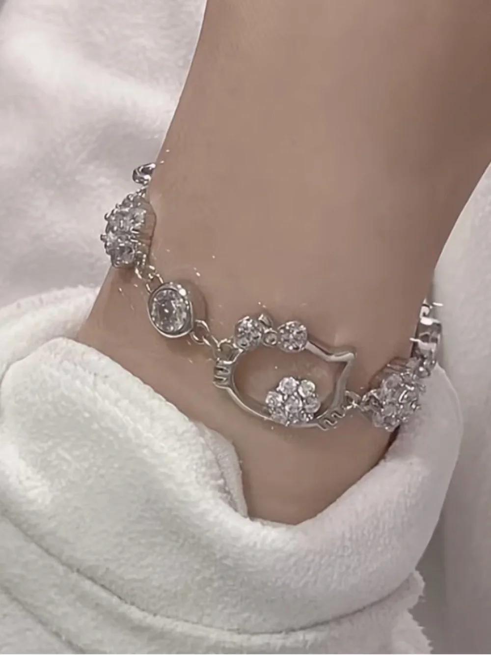 Hello Kitty Silver Tone Charm Bracelet with Sparkling Crystal Accents